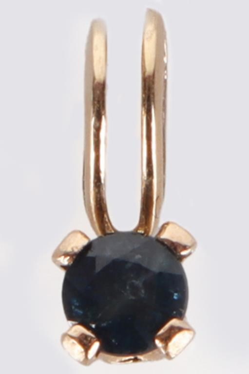 14K YELLOW GOLD LADIES PENDANT W/ ROUND TOPAZ: 14k yellow gold ladies pendant with a 0.07 round-cut topaz gemstone. Stone Type: Topaz Weight: 0.15 grams Size: 8 x 3.2mm Condition: See pictures.