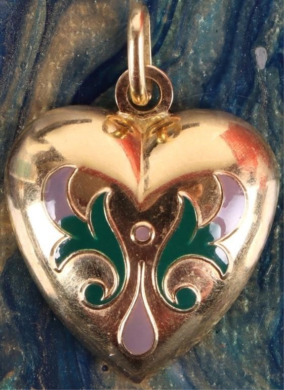 18K YELLOW GOLD FLORAL DESIGN HEART PENDANT: 18K yellow gold floral design ladies heart pendant. It is a puffy heart shaped pendant with a decorative enameled motif in green and purple colors. Weight: 3.76 Grams Condition: Gently used. See image