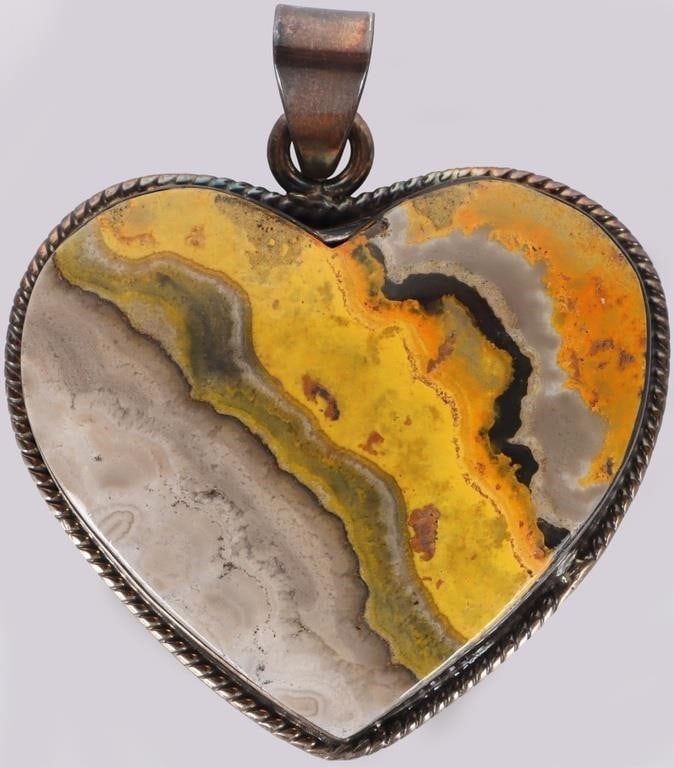 SW STYLE 925 BUMBLEBEE JASPER LADIES HEART PENDANT: Southwest style sterling silver ladies pendant with a large heart-cut bumblebee jasper stone. Stone Type: Bumblebee jasper Weight: 35.19 grams Size: 55.75 x 47mm Condition: See pictures.