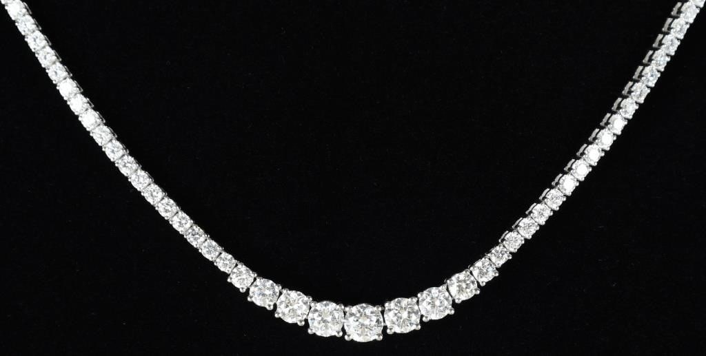 18K WHITE GOLD LAB DIAMOND LADIES NECKLACE: 18K white gold lab diamond ladies necklace. Gemstones to include one-hundred sixty-five 0.04ct, two 0.07ct, two 0.15ct, two 0.25ct, two 0.33ct and one 0.50ct round cut lab diamonds. Stone Type: Diamon
