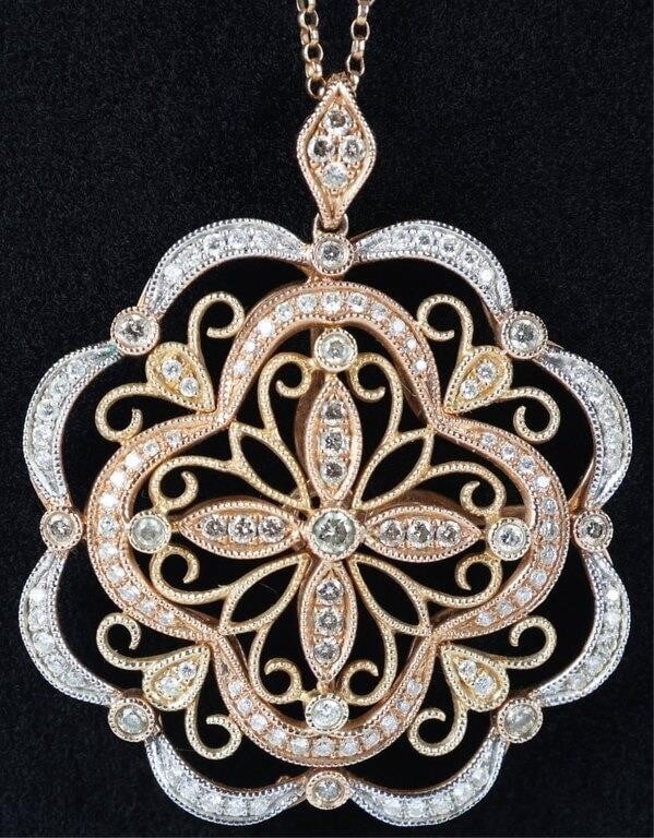 129 DIAMONDS 14K WHITE YELLOW ROSE GOLD NECKLACE: 14k gold ladies necklace with an elaborate rosette pendant. The chain is rose gold, the inner pendant is rose gold, the border is white gold, and the diagonal details within the inner pendant and betw
