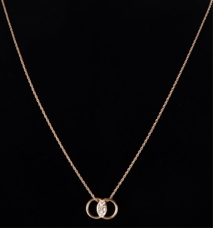 14K YELLOW GOLD NATURAL DIAMOND LADIES NECKLACE: 14K yellow gold rope chain natural diamond marriage symbol Dangler Studios ladies necklace. Gemstones to include ten 0.10ct round cut natural diamond and two 0.07ct round cut natural diamonds. Stone T