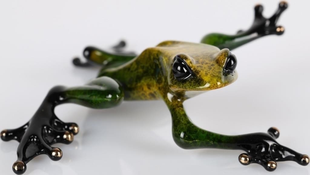 T. COTTERILL 'TWISTER' FROGMAN SCULPTURE 365/5000: Tim Cotterill " Twister" Frogman sculpture. Limited edition 365/5000 Beautifully colored in green, gold and black in a twisted pose, Signed and numbered on the bottom of the frog. Size: 1" x 3.5" x 3.