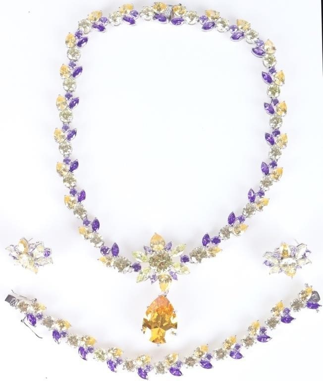 LARGE COLORFUL RHINESTONE HEAVY MATCHING SET: Large colorful purple, green and yellow rhinestone heavy matching set with one pair of earrings, one necklace and one bracelet. Size: 16" Necklace Condition: Like new, see images. May have silver mark