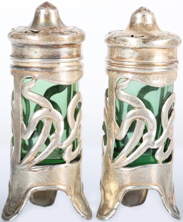 BIRMINGHAM SILVER & GREEN GLASS S&P SHAKER SET: Birmingham England sterling silver & emerald green glass salt and pepper shaker set. There are 3 hallmarks on each shaker a lion, an anchor and an i. The hallmark dates it between 1883-1908. Beautiful