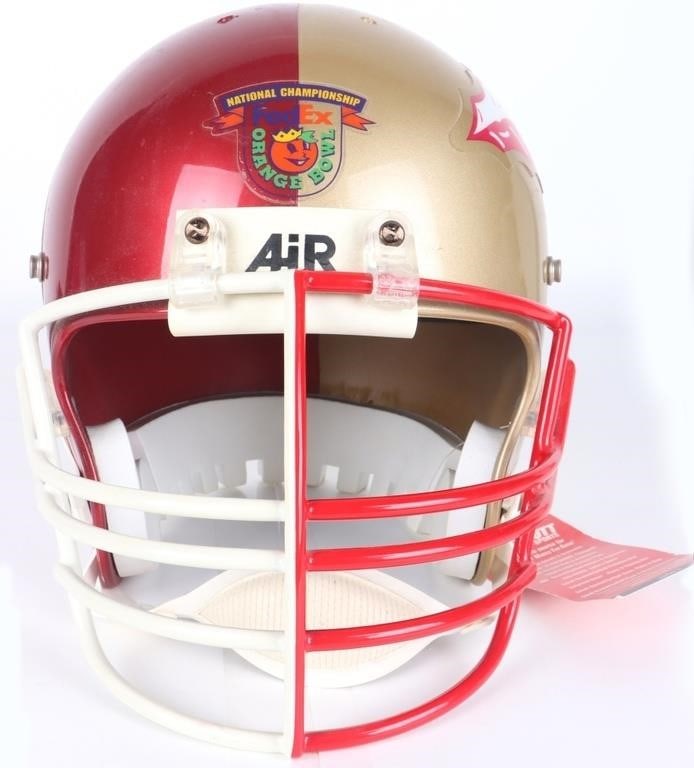 2001 ORANGE BOWL SEMINOLES SOONERS FB HELMET: 2001 Orange Bowl-themed football helmet. One half features the FSU Seminoles logo and colors and the other half features the University of Oklahoma Sooners logo and colors. Condition: Wear