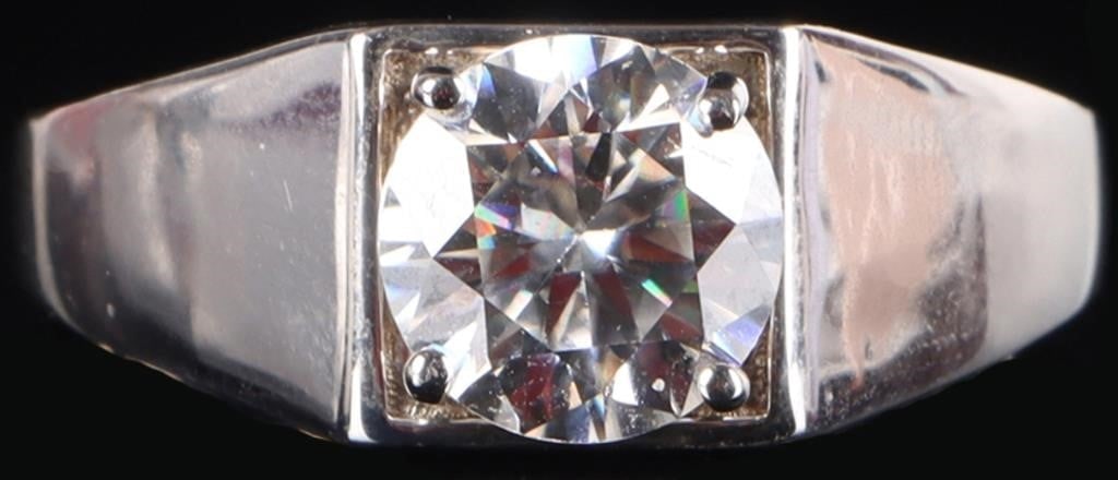 2CT PRINCESS CUT MOISSANITE STERLING LADIES RING: 2CT princess cut moissanite solitaire ladies ring set in sterling silver. Stone Type: Moissanite Weight: 5.04 Grams Size: US 10.0 Condition: Slight surface scratches from normal wear. See images for