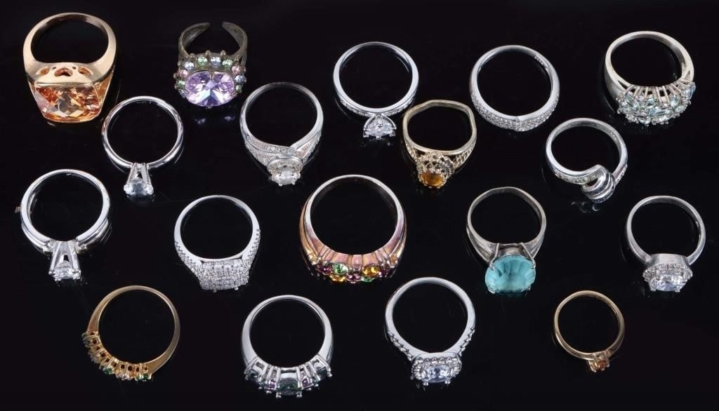 FINELY CRAFTED LADIES RINGS (18) ONE GOLD-PLATED: Finely crafted assorted gemstone ladies rings. One is plated with 14K white gold with 14K yellow gold highlights. There are also a couple sterling silver rings in this lot. This lot of eighteen rings
