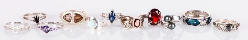 STERLING SILVER LADIES RINGS TAHITIAN PEARLS (11): Sterling silver ladies rings of 11. Of note are a ring with two spinel gemstones, a ring with a spinel gemstone in the shape of a heart, a ring with a garnet gemstone, and a ring with two Tahitian