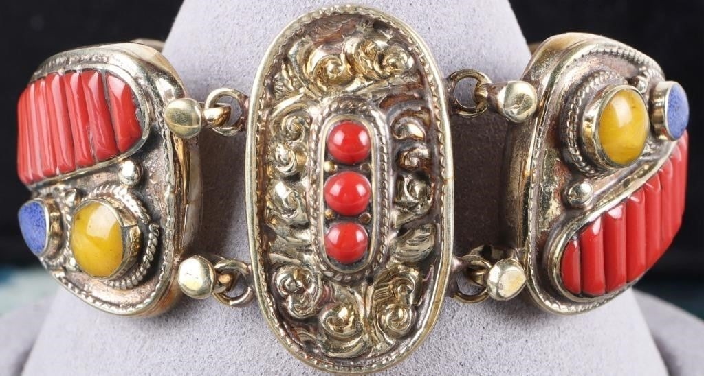 SW STYLE STERLING SILVER LADIES BRACELET W/ JASPER: Southwest-style sterling silver ladies bracelet with colorful jasper and blue howlite along its band. The surface of the metal features a light gold-tone wash. Stone Type: Jasper Weight: 71.18 grams