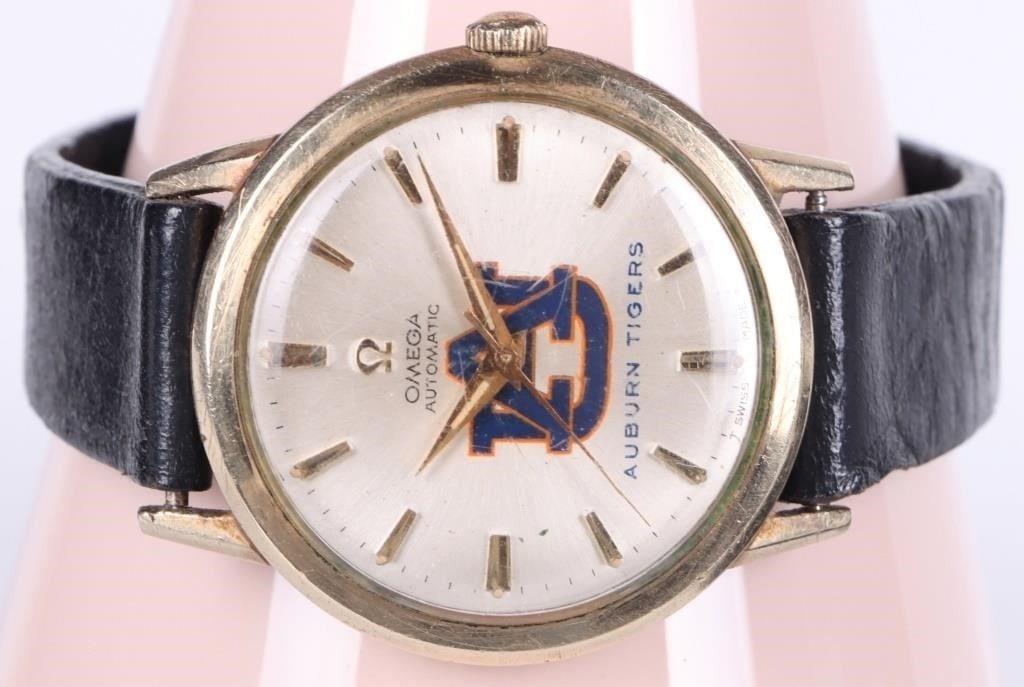 10K GOLD FILLED OMEGA WATCH AUBURN TIGERS FACE: Omega automatic wristwatch with a 10k gold-filled bezel and the Auburn Tigers logo printed on the face. Omega Unisex Weight: 32 grams Size: 29mm Condition: See pictures.