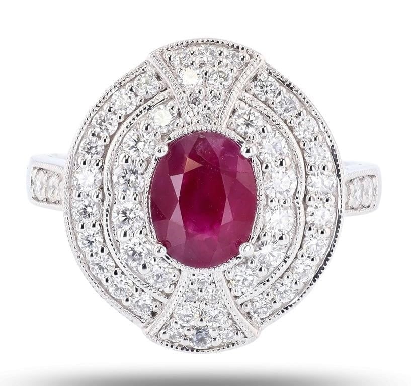 1.28CT BURMESE RUBY PLATINUM LADIES RING W DIA GIA: One polished, stamped, and tested platinum ring marked Oscar Friedman. The ring is mounted with: 1 genuine GIA certified Burmese. Ruby cent stone weighing 1.28 carts, and 56 genuine round diamonds wei