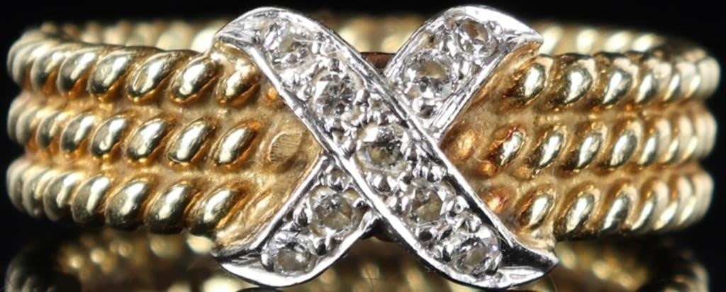 14K YELLOW GOLD TRIPLE COIL DIAMOND X LADIES RING: 14K yellow gold triple coil diamond X ladies ring. Gemstones to include nine 0.01ct round cut diamonds. Stone Type: Diamond Weight: 6.27 Grams Size: 4.25 U.S. Condition: Little wear, see images for de