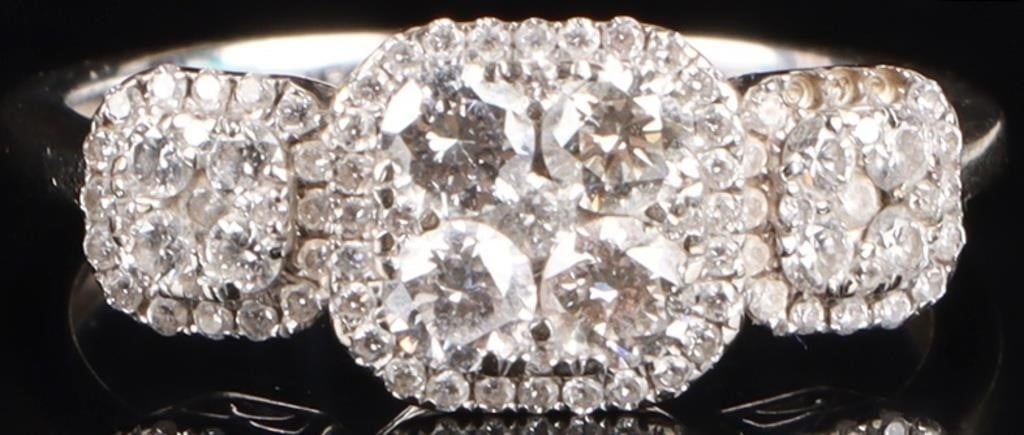 18K WHITE/YELLOW GOLD NATURAL DIAMOND LADIES RING: 18K white & yellow gold natural diamond ladies ring. Gemstones to include one 0.10ct round cut natural diamond, two 0.07ct round cut natural diamond, and two 0.05ct round cut natural diamonds. All dia
