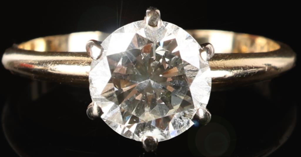 NATURAL DIAMOND 14K YELLOW GOLD LADIES RING: 14K yellow gold ladies ring featuring a dazzling 1.5CT round cut natural diamond in a high solitaire setting. Stone Type: Diamond Weight: 2.41 Grams Size: 6.5 U.S Condition: Very fine
