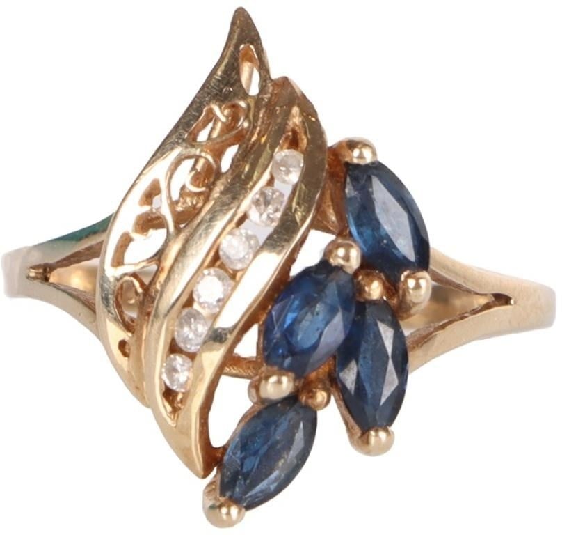14K YELLOW GOLD LADIES RING W/ DIAMONDS & TOPAZ: 14k yellow gold ladies ring with three ribbons on the face. One is composed of a cluster of 0.03ct marquise-cut London topaz gemstones, another features six 0.01ct round-cut diamonds, and another feat