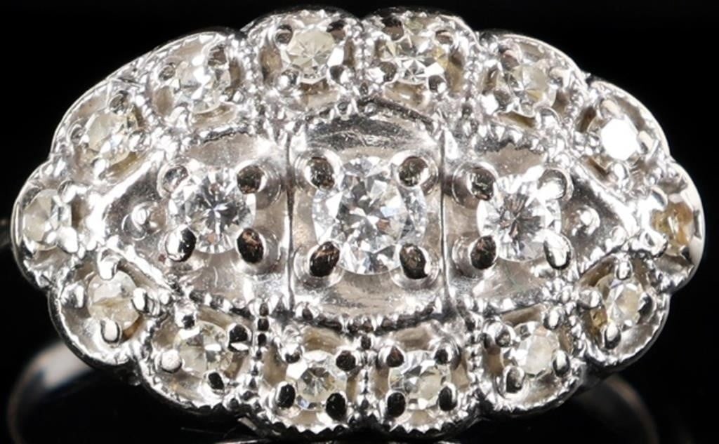 14K WHITE GOLD NATURAL DIAMOND ART DECO RING: 14K white gold natural diamond art deco ladies ring. Gemstones to include one 0.10ct round cut natural diamond, two 0.04ct round cut natural diamonds, and fourteen 0.02ct round cut natural diamonds. S