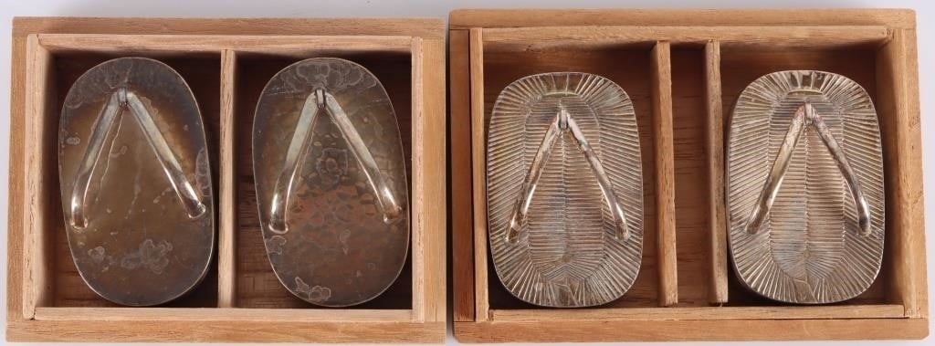 ANTIQUE STERLING SILVER JAPANESE SANDALS SHAKERS-2: Lot of two sets of antique 950 sterling silver salt & pepper shakes moulded in the shape of Japanese geta sandals. One pair features woven texturing on its surface while the other features rough metal