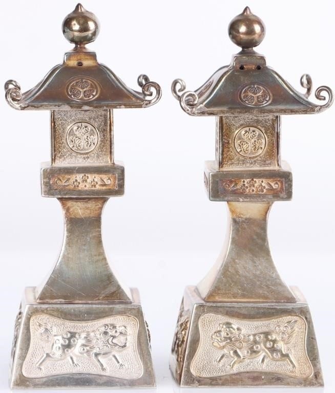 ANTIQUE STERLING SILVER STONE PAGODA SHAKERS: Set of antique 950 sterling silver salt and pepper shakers moulded in the shape of Japanese stone pagodas. Weight: 69.87 grams Size: 3.25 x 1.25 x 1.25 each Condition: Wear commensurate with age, see 