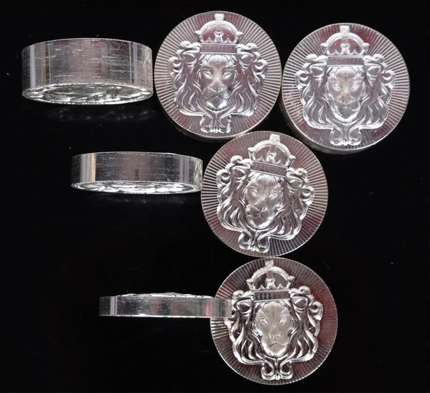 SCOTTSDALE MINT 25.48OZ FINE SILVER STACK ROUNDS-7: A premium and luxurious set of seven fine silver Scottsdale Mint stackers, totaling roughly twenty-five and a half Troy ounces. Each stacker features a crowned lion on either side, one in raised etche