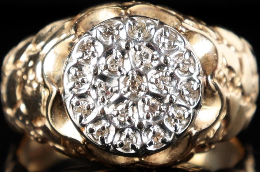 10K YELLOW GOLD DIAMOND CLUSTER LADIES RING: 10K yellow gold diamond cluster cobblestone engraved ladies ring. Gemstones to include nineteen 0.01ct round cut diamonds. Stone Type: Diamond Weight: 6.93 Grams Size: 10.00 U.S. Condition: Little wea