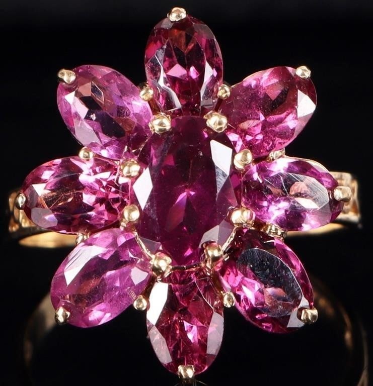 10K YELLOW GOLD LADIES RING W/ SYNTH TOURMALINE: 10k yellow gold ladies ring with nine synthetic tourmaline gemstones arranged in a floral pattern. Stone Type: Tourmaline Weight: 4.39 grams Size: US 8.25 Condition: See pictures.