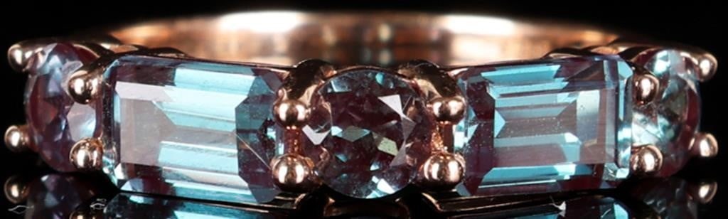 1.17CTW BICOLOR SAPPHIRE 10K ROSE GOLD LADIES RING: 10k rose gold ladies ring with two 0.21ct baguette-cut bicolor sapphire gemstones and three 0.75ct round-cut bicolor sapphire gemstones. Stone Type: Bicolor Sapphire Weight: 2.72 grams Size: US 7.25