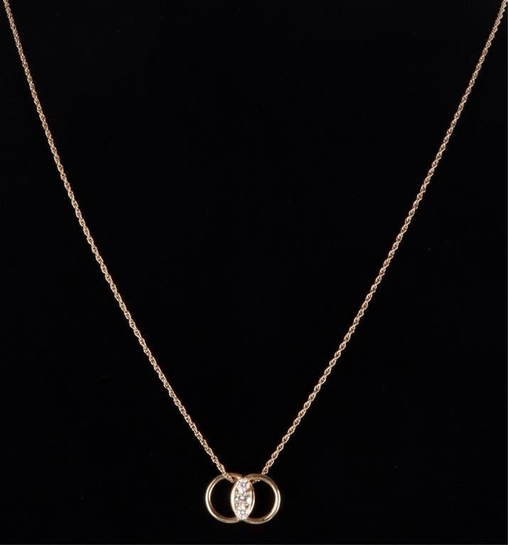 14K YELLOW GOLD NATURAL DIAMOND LADIES NECKLACE: 14K yellow gold rope chain natural diamond marriage symbol Dangler Studios ladies necklace. Gemstones to include ten 0.10ct round cut natural diamond and two 0.07ct round cut natural diamonds. Stone T