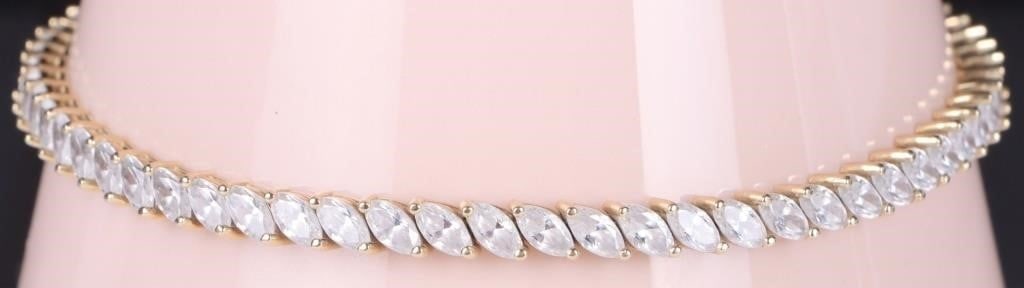 14K YELLOW GOLD CUBIC ZIRCONIUM LADIES BRACELET: 14K yellow gold cubic zirconium ladies bracelet. Stone Type: CZ Weight: 11.41 Grams Size: 8.0" length Condition: See images.