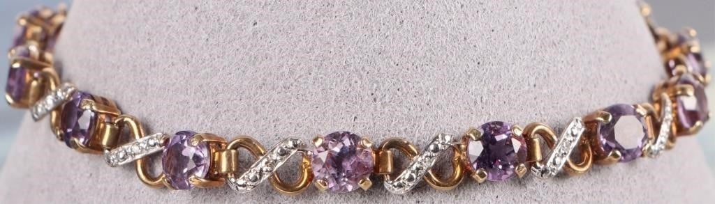 14K YELLOW GOLD DIAMOND & AMETHYST BRACELET: 14k yellow gold diamond and amethyst ladies bracelet with 13 0.01ct round diamonds, and 12 0.5ct round amethyst stones. Stone Type: Diamond Weight: 6.25 Grams Condition: Very fine.
