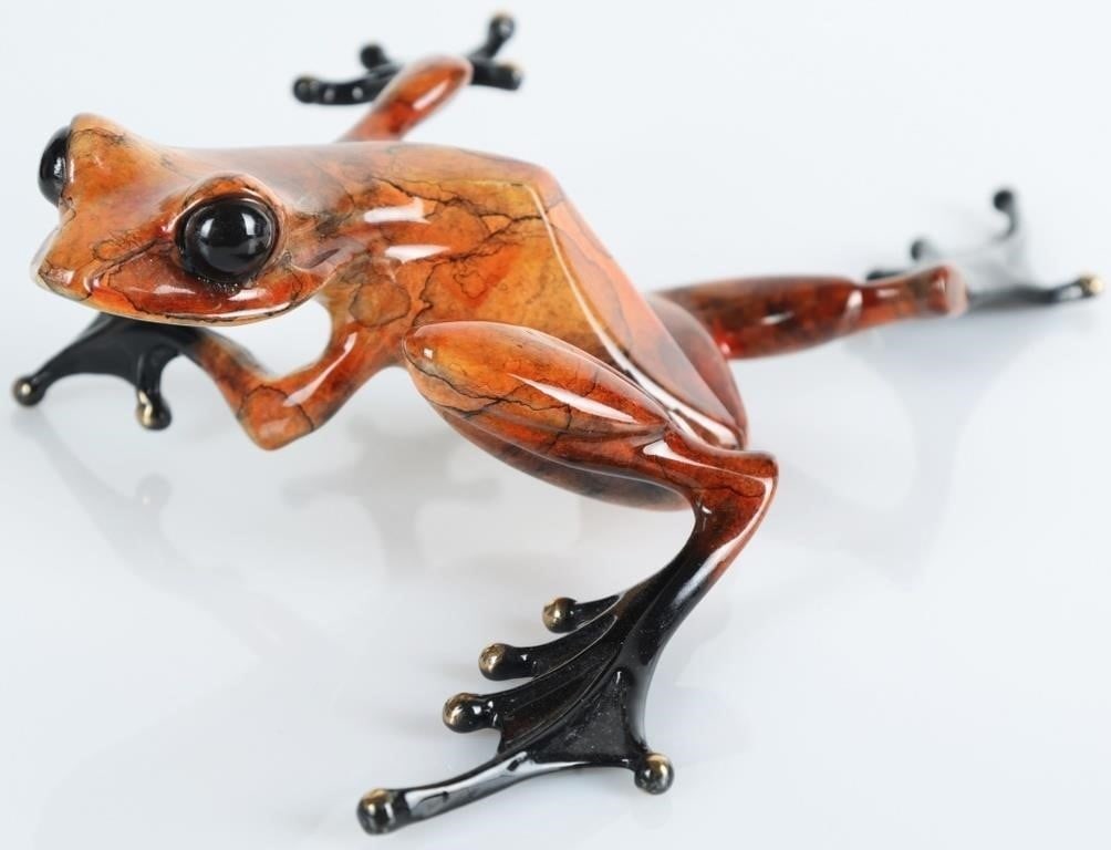 TIM COTTERILL 'TWIST' SCULPTURE 723/2000: Tim Cotterill "Twist" Frogman bronze frog sculpture limited edition 723/2000. The beautiful colors are orange shades marbled with a lot of black lines and shading with a beautiful patina. Signed on th