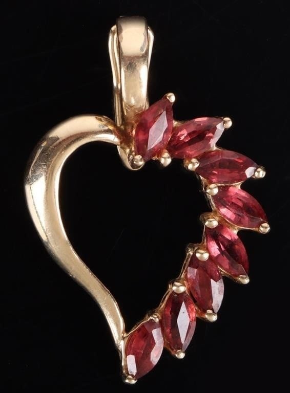 14K YELLOW GOLD PINK GLASS LADIES PENDANT: 14K yellow gold pink glass ladies pendant. Weight: 3.61 Grams Size: 1.25" Length Condition: Very fine.