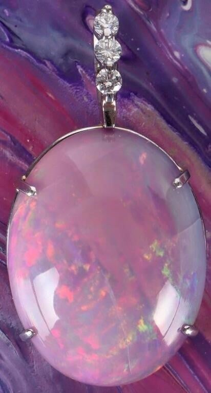 14K WHITE GOLD LADIES PENDANT W/ GIANT PINK OPAL: 14k white gold ladies pendant with a 23 x 18mm pink opal stone. Stone Type: Opal Size: 33.6 X 18mm Condition: The opal is heat treated. See pictures.