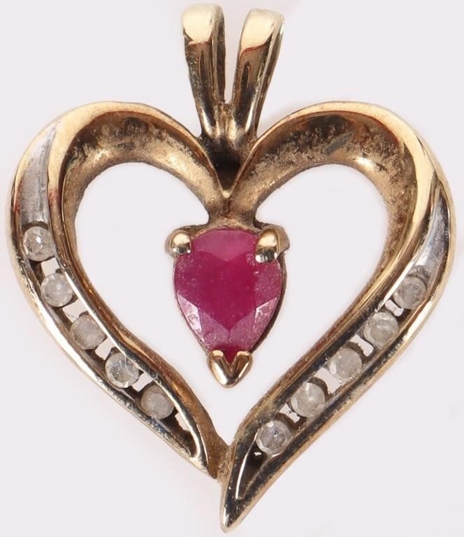 10K YELLOW GOLD HEART PENDANT W/ RUBY & DIAMONDS: 10k yellow gold ladies heart pendant with a 0.3ct pear-cut center ruby with ten 0.01ct round-cut accessory diamonds. The areas around the diamonds are white gold. Stone Type: Diamonds & Ruby Weight: 2