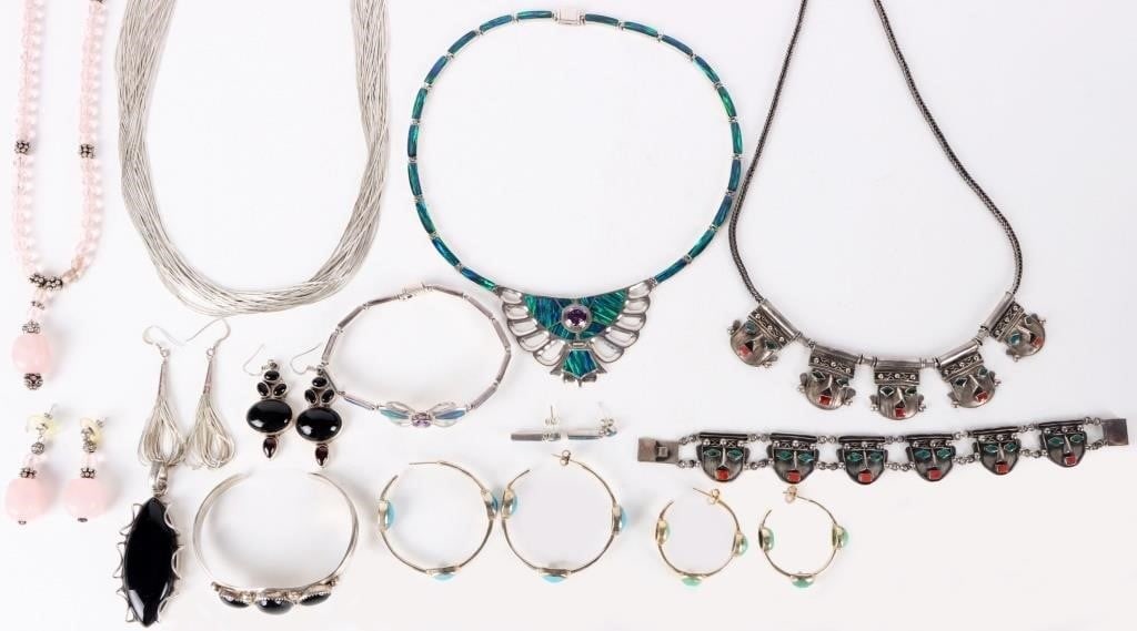 STERLING SILVER LADIES JEWELRY SETS LOT OF 6: This lot contains 6 different ladies sterling silver jewelry sets. There are earrings, necklaces, bracelets and pendants. Weight: 255.5 Grams Condition: Gently used. May have slight surface scratches 