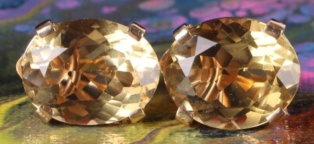 14K YELLOW GOLD CITRINE LADIES CLIP-ON EARRINGS: 14K yellow gold citrine ladies clip-on earrings. Gemstones to include one 16.83mm X 13.04mm oval cut citrine per earring. Stone Type: Citrine Weight: 10.59 Grams Size: 1.25" Condition: Little to no we