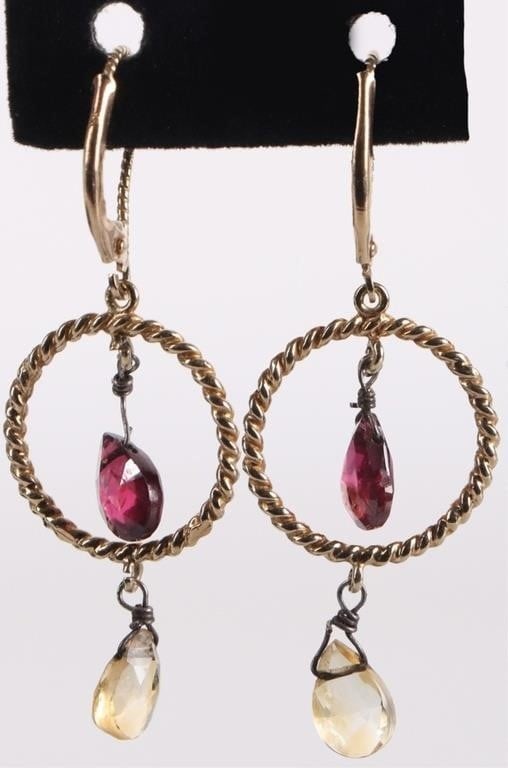 14K YELLOW GOLD LADIES EARRINGS W GARNET & CITRINE: 14k yellow gold ladies earrings with two 0.45ct pear-cut gemstones each, one garnet gemstone hanging in a loop and one citrine gemstone hanging below the loop. Stone Type: Citrine and Garnet Weight: 3