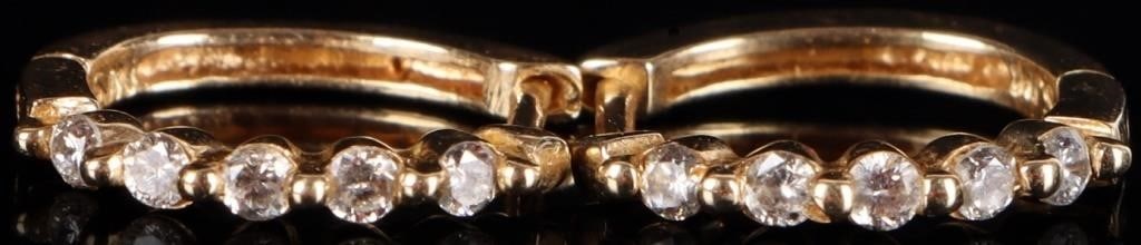 14K YELLOW GOLD DIAMOND LADIES EARRINGS: 14K yellow gold diamond ladies earrings. Gemstones to include five 0.02ct round cut diamonds. Stone Type: Diamond Size: 0.50" Condition: Little wear, see images for details.