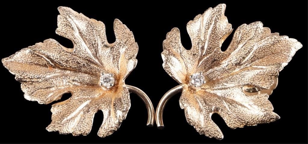 14K YELLOW GOLD DIAMOND LEAF LADIES EARRINGS: 14K yellow gold diamond leaf ladies earrings. Gemstones to include one 0.02ct round cut diamond per each earring. Stone Type: Diamond Weight: 3.88 Grams Size: 1.00" Condition: Little wear, see images 