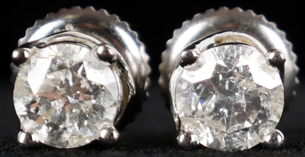 14K WHITE GOLD LADIES STUD EARRINGS W/ DIAMONDS: 14k white gold ladies stud earrings, each of which are set with 0.33ct round-cut diamonds. Stone Type: Diamond Weight: 1.58 grams Size: 4.78mm diameter Condition: See pictures.