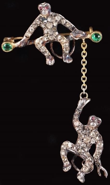 14K GOLD & 925 CIRCUS MONKEYS LADIES BROOCH/PEND: Ladies brooch/pendant of a pair of trapeezing monkeys, with one sitting on the bar and the other hanging off. The pin is 14k yellow gold while the rest of the piece is either sterling silver or gold-c