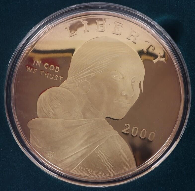 2000 SACAGAWEA 4 OZ FINE SILVER 24K LAYERED ROUND: 2000 Sacagawea 4 Troy ounces fine silver 24K gold layered Washington Mint round with original boxing. Weight: 124.416 Grams Condition: Mint State (Proof) uncirculated.