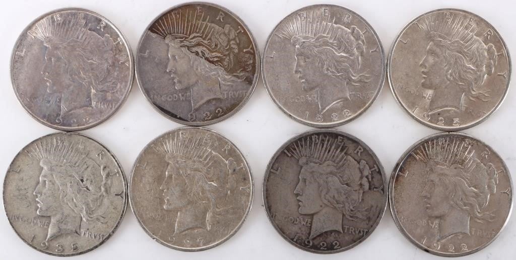 ASSORTED 90% SILVER LIBERTY PEACE DOLLARS - (8): Eight assorted 90% silver Liberty Peace Dollars. Weight: 213.84 Grams Condition: Ranging from Good to Mint State uncirculated.