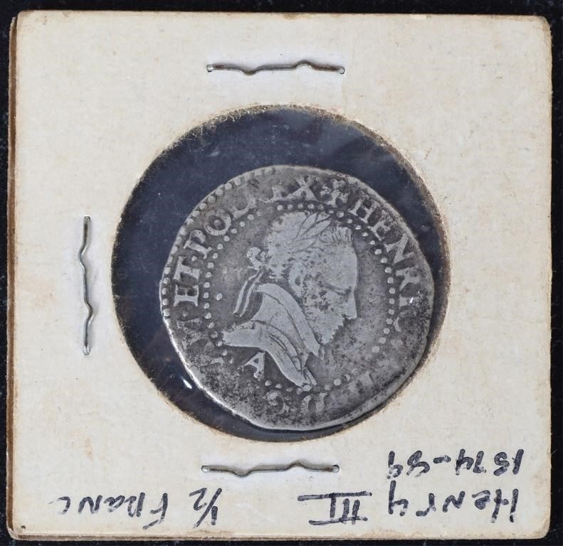 HENRY III 1/2 FRANC ANTIQUE SILVER COIN 1574-1589: Antique Henry III 1/2 Franc silver French coin from between 1574 to 1589. Henry III reigned during the later stages of the French Wars of Religion and was murdered for his assassination of the leader 
