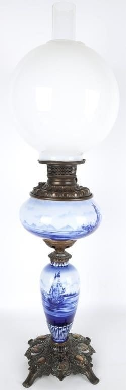 ANTIQUE VICTORIAN BLUE DELFT GLASS OIL LAMP: Antique Victorian blue Delft glass banquet oil lamp. Unconverted, includes original shades. The Delft features maritime scenes. 8.2 lbs. Size: 20.5 x 9 x 9" Condition: Wear commensurate with age, see 