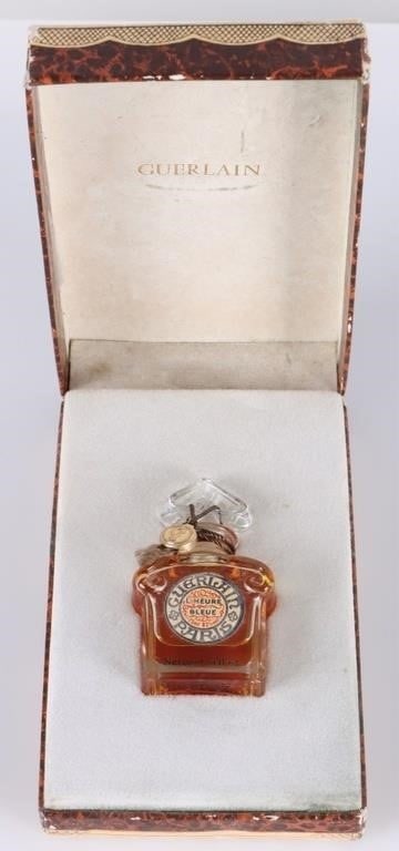 VINTAGE GUERLAIN L'HEURE DE BLEUE SEALED PERFUME: Vintage 60's/70's Guerlain L'heure de Bleue 1/4 oz perfume bottle with original case. The bottle is full and sealed Size: 2.5 x 1.25 x .75" bottle Condition: Wear commensurate with age, see pictures f