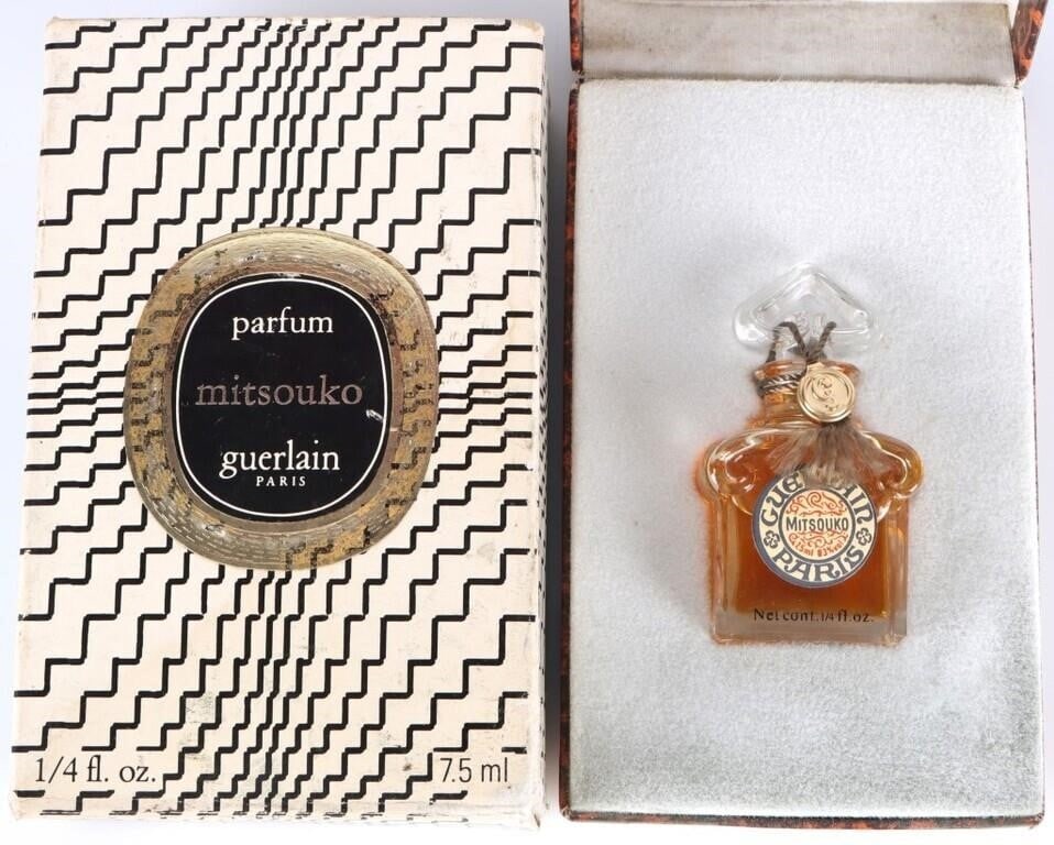 VINTAGE GUERLAIN MITSOUKO 1/4 OZ SEALED PERFUME: Vintage Guerlain Mitsouko 1/4 oz sealed perfume with original case and box. Size: 2.5 x 1.25 x .75" bottle Condition: Wear commensurate with age, see pictures for more detail.