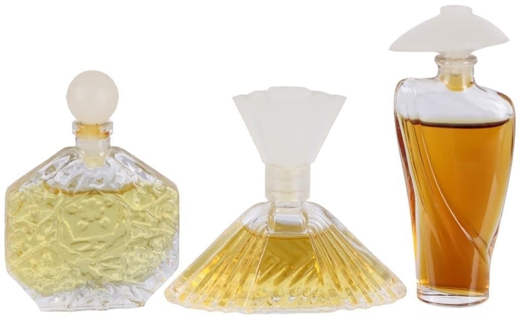 VINTAGE MINI PERFUME BOTTLES LALIQUE LAUREN ETC 12: Lot of twelve vintage mini perfume bottles, to include Lauren by Ralph Lauren, Lalique Eau de Toilette, Magnom Caron Narcisse Noir (missing label), a sealed unlabeled Chanel bottle, a purse perfume at