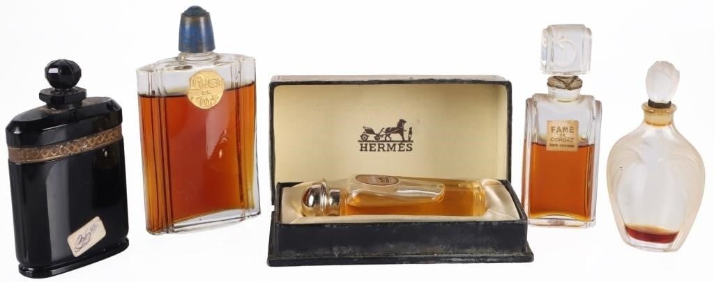 ANTIQUE/VINTAGE PERFUME BOTTLES HERMES ETC (5): Lot of five antique/vintage perfume bottles, to include Hermes Parfum Caleche, Fame de Corday, Tea Rose, Caron Nuit de Noel, and L'Origan de Coty. Condition: Wear commensurate with age, see pictures f