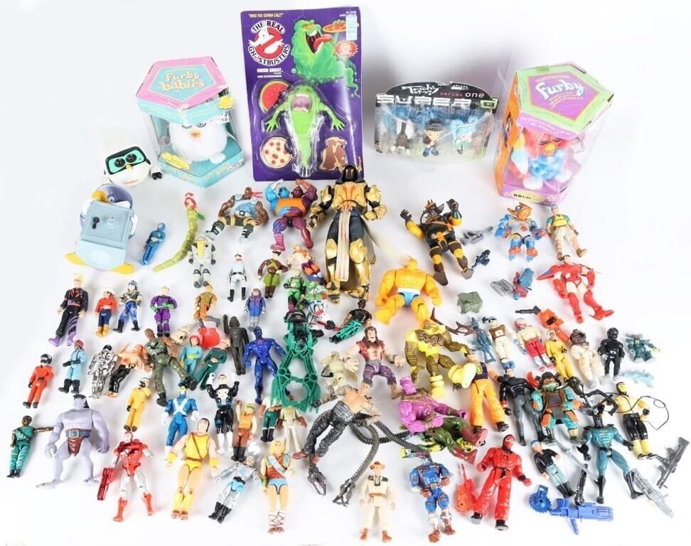 MEGA LOT VINTAGE AND MODERN TOYS GI GOE TMNT (72): Lot of seventy-two vintage and modern action figures from the late seventies to the 2020's. Of note are the white Furby Baby (packaged in damaged box), the KB Toys exclusive Statue Of Liberty Furby (p